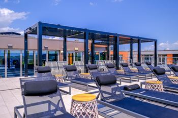 A rooftop with pool and elegant sundeck, creates a sanctuary with panoramic views of the potomac and anacostia rivers, and the national mall